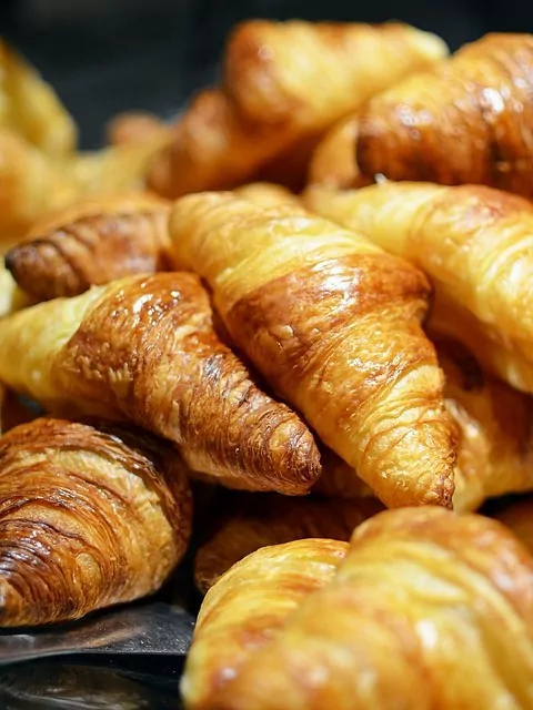 An image of freshly baked croissants. Time-Lapse of baking.